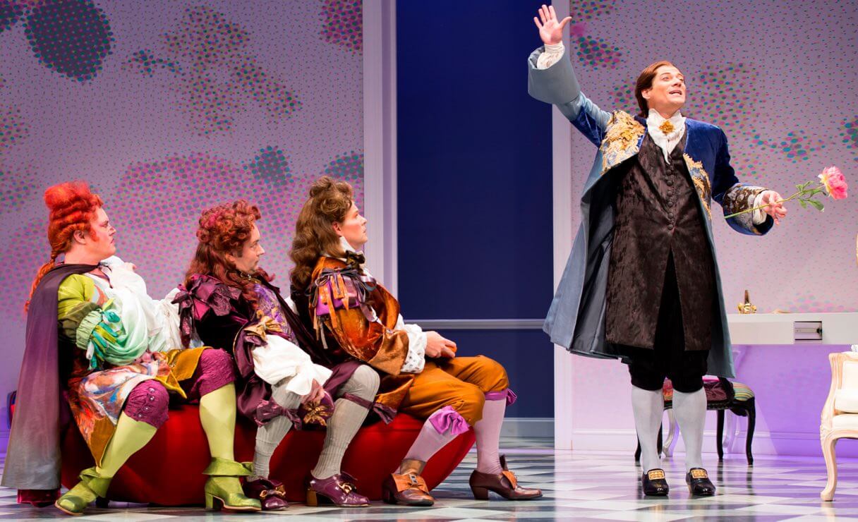 actors in period costume on stage